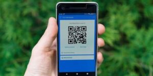 a smartphone with an app to create qr codes